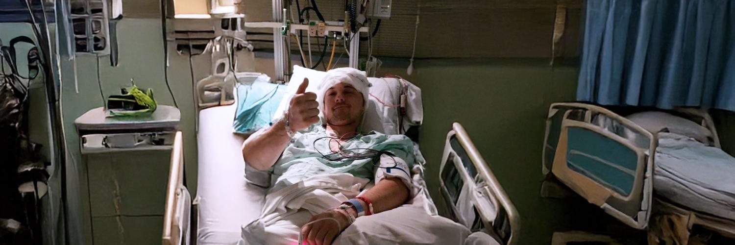 Brenda Grigg with her husband in the hospital.