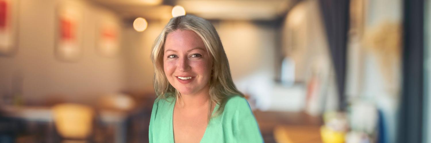 Voices of ERB: Raechel Sims: Diabetes supplies Raechel Sims in warmly lit restaurant.