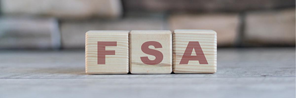 Wooden blocks spelling out F-S-A
