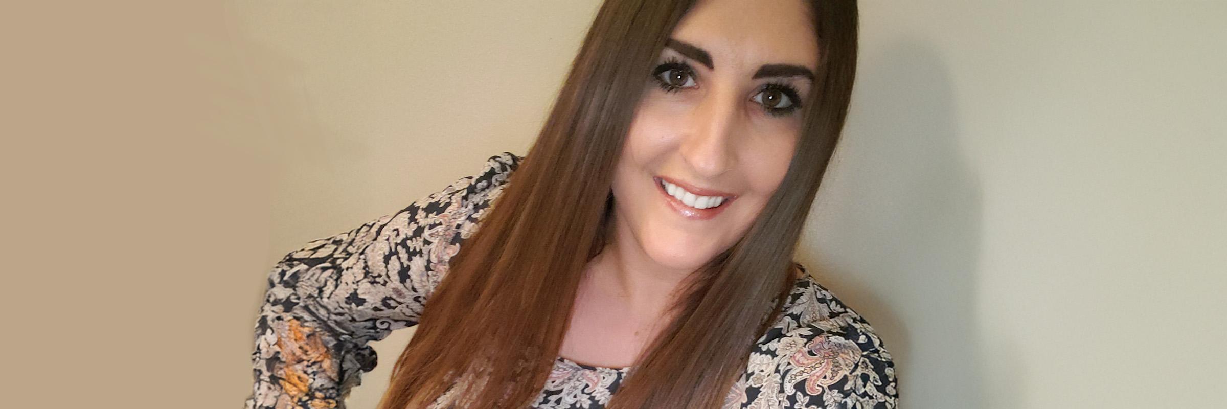 A selfie phot of a female individual.